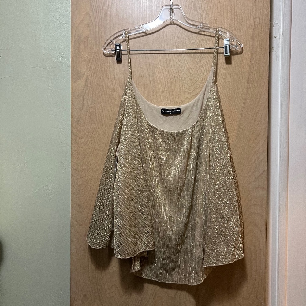 Loose fit metallic top